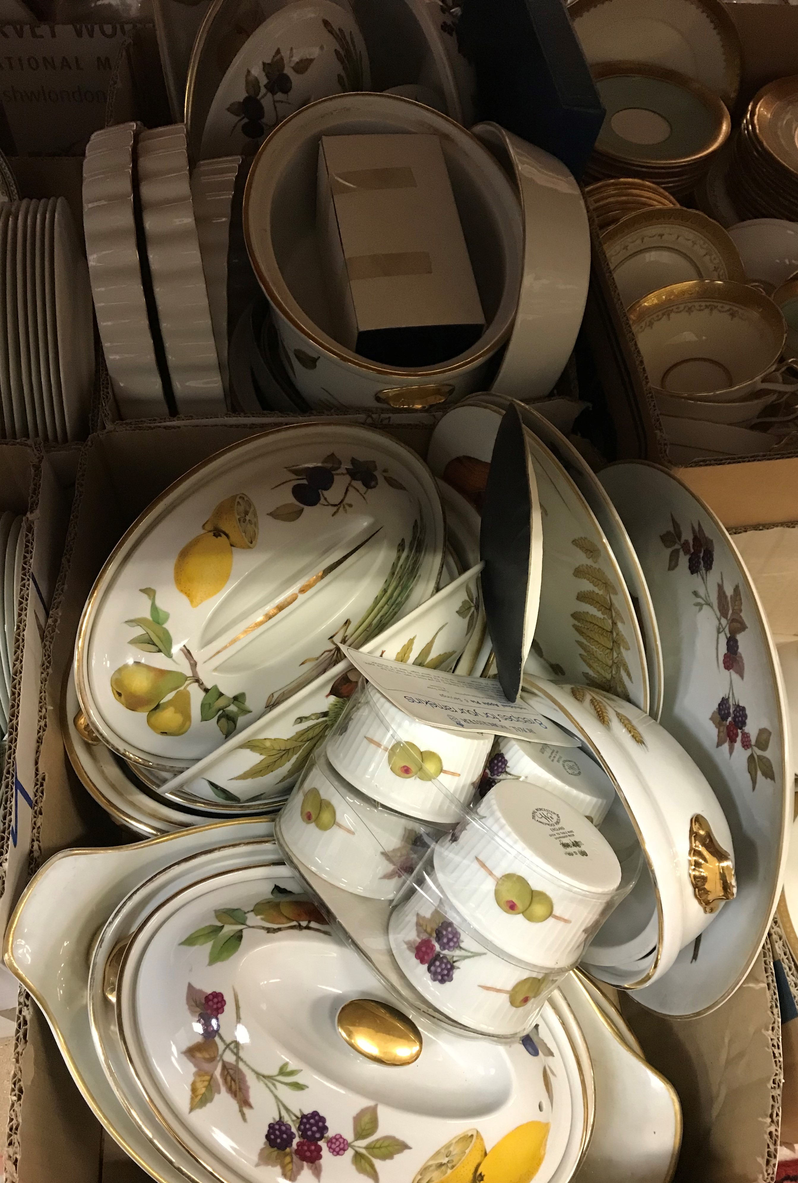 A collection of Royal Worcester "Evesham" and "Wild Harvest" oven to table wares including oven