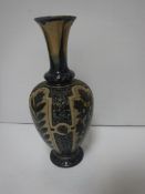 A Doulton Lambeth floral and foliate decorated vase by William Parker and Harriet E Hibbut,