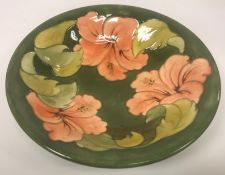 A Moorcroft shallow bowl,