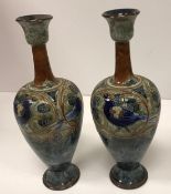 A pair of Royal Doulton stoneware baluster vases by Francis C Pope with blue and green glaze and