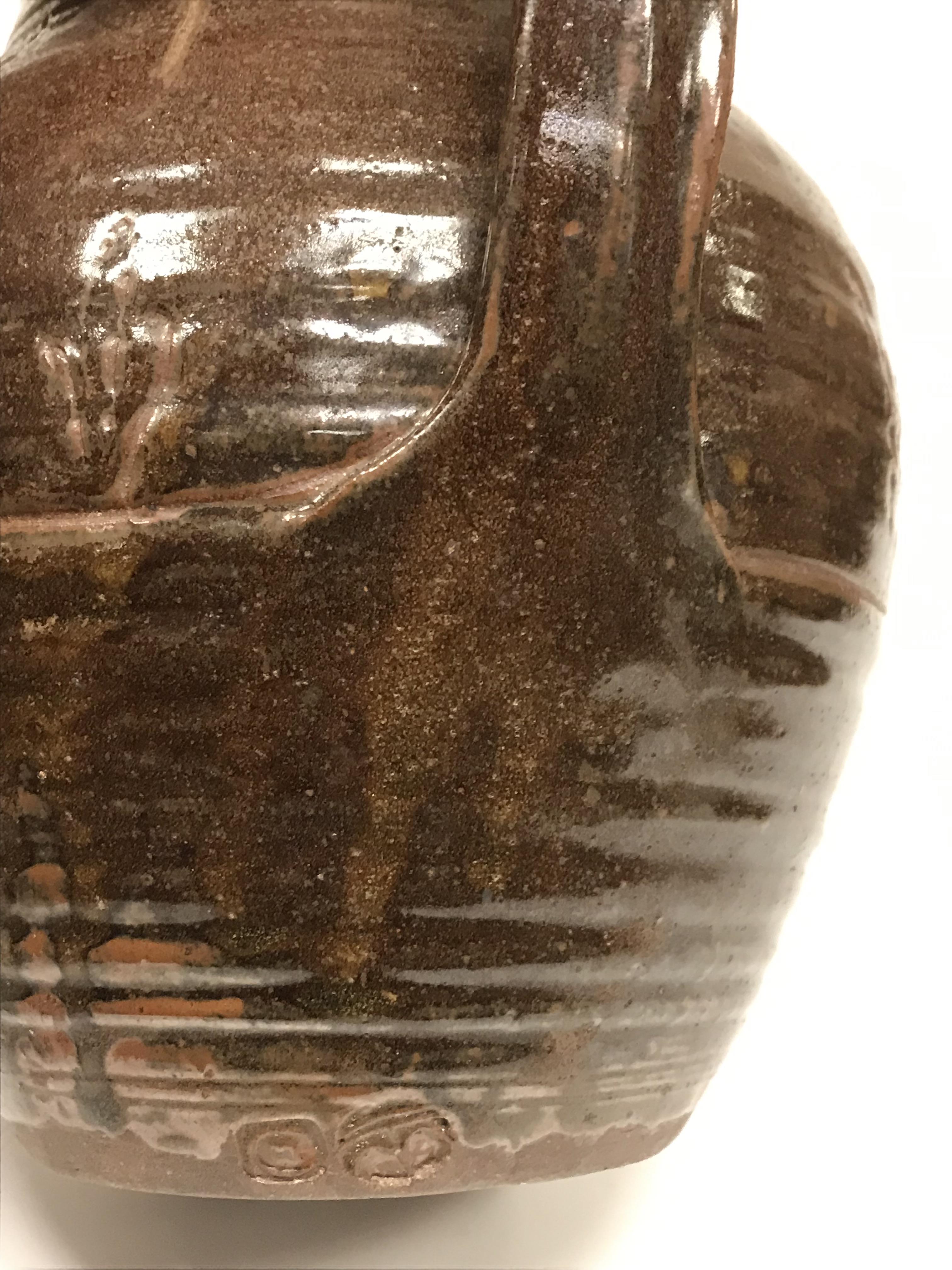 A Michael Cardew Wenfordbridge Pottery brown glazed ribbed jug with stylized floral spray - Image 19 of 22
