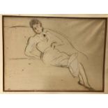 PAUL CÉSAR HELLEU (1859-1927) “Femme sur un canapé” charcoal and chalks, initialed lower left,