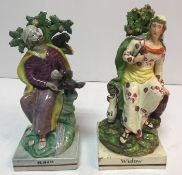 A pair of 18th Century Staffordshire pearlware figures,