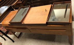 A mid 20th Century teak dressing table in the G Plan style,