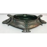 An Art Nouveau pewter table centre bowl with figural decoration and Ruskin style turquoise inset