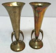 A pair of Edwardian silver trumpet shaped hammered silver vases in the Art Nouveau style of