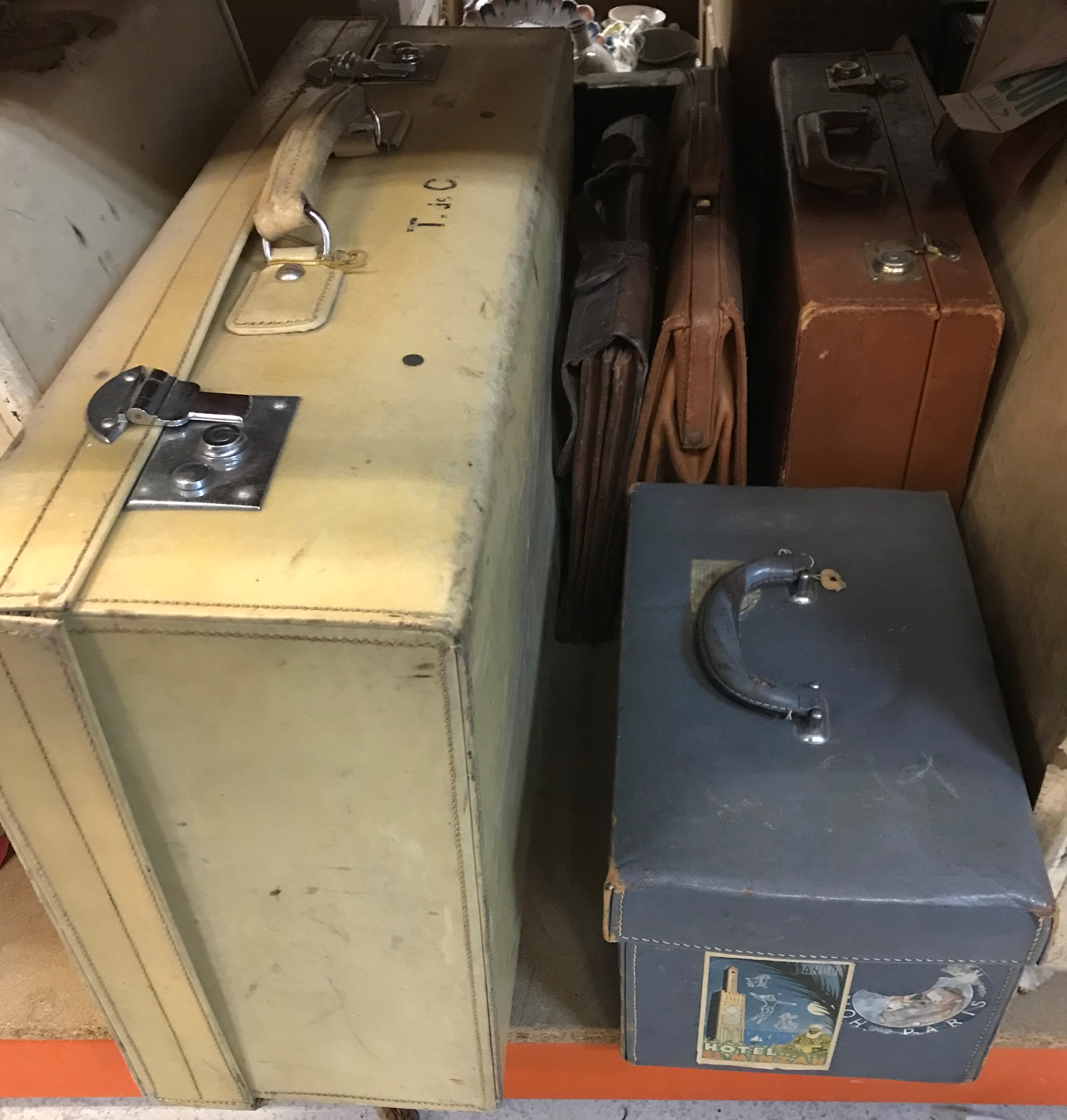 A collection of three various vellum covered suitcases, three briefcases, - Image 4 of 5