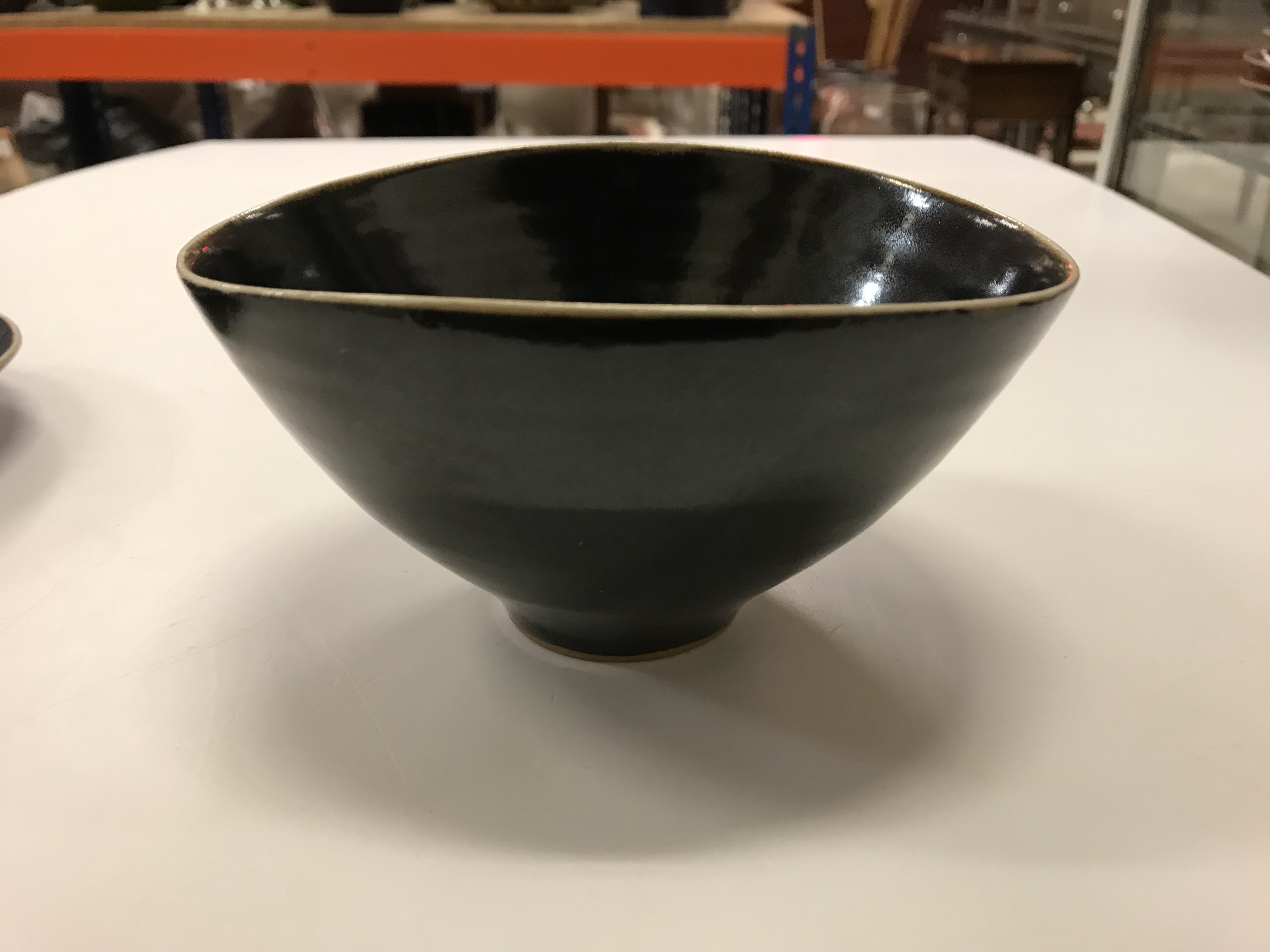 A Lucie Rie black glazed elliptical bowl and saucer, both bearing Lucie Rie marks, - Image 4 of 13