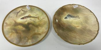 A pair of Royal Doulton fish plates,