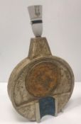 A Troika table lamp of wheel form with relief decoration signed "Troika Cornwall MB" to base for