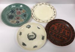 A collection of four early 20th Century plates comprising a Spode Royal Jasmine reindeer design