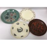 A collection of four early 20th Century plates comprising a Spode Royal Jasmine reindeer design