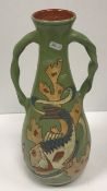 A C H Brannam Barum ware pottery vase of baluster form with incised fish decoration on a pale green