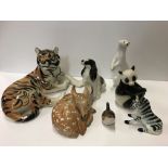 A large collection of Lomonosov USSR animal figurines to include tigers, deer, various dogs, zebra,