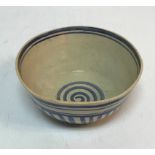 An Omega Workshops (possibly Roger Fry) bowl with blue and white striped decoration and Omega mark