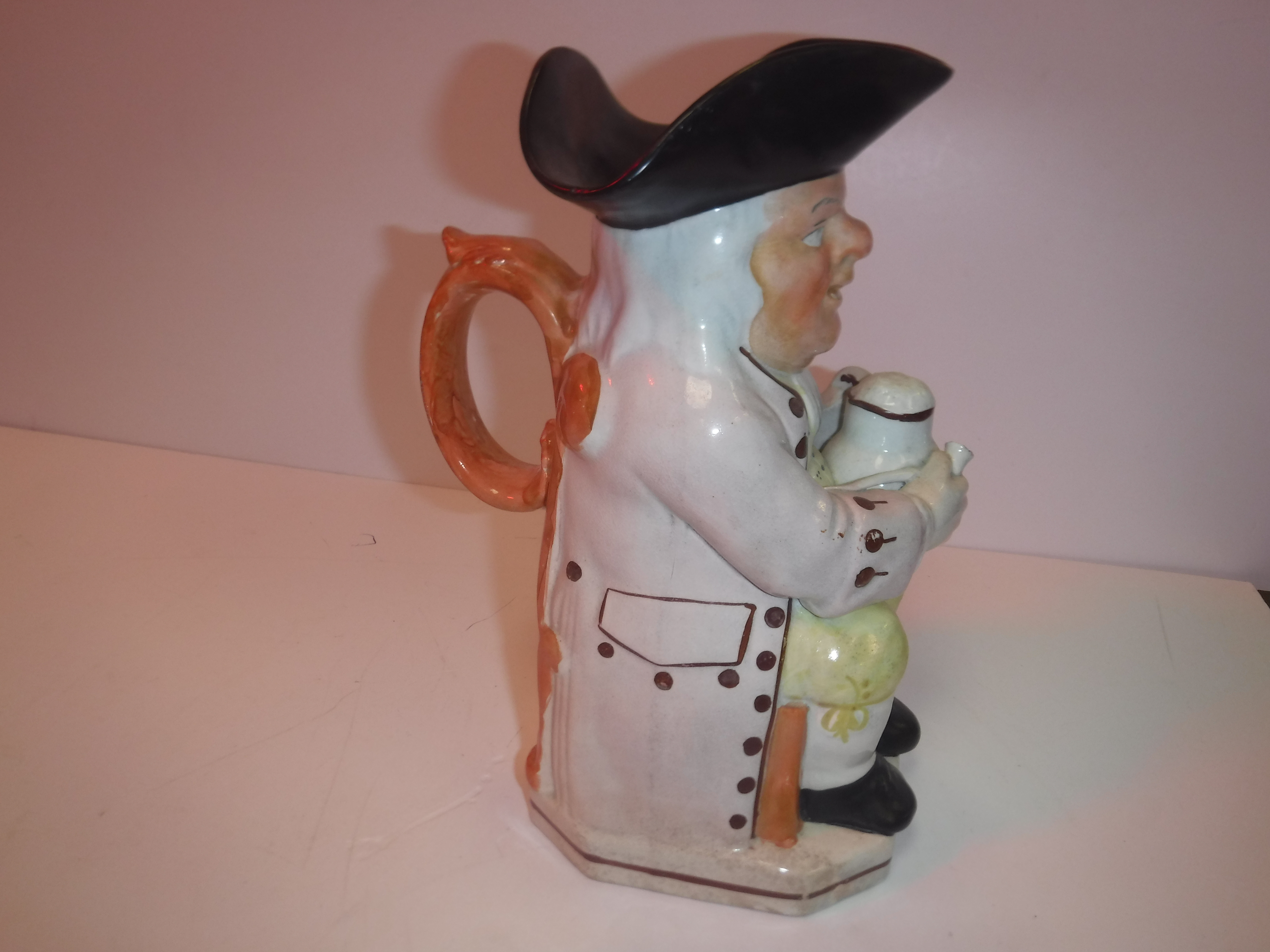 A 19th Century Staffordshire pottery Toby jug as "Toby Philpott seated with jug of ale on his left - Image 16 of 16