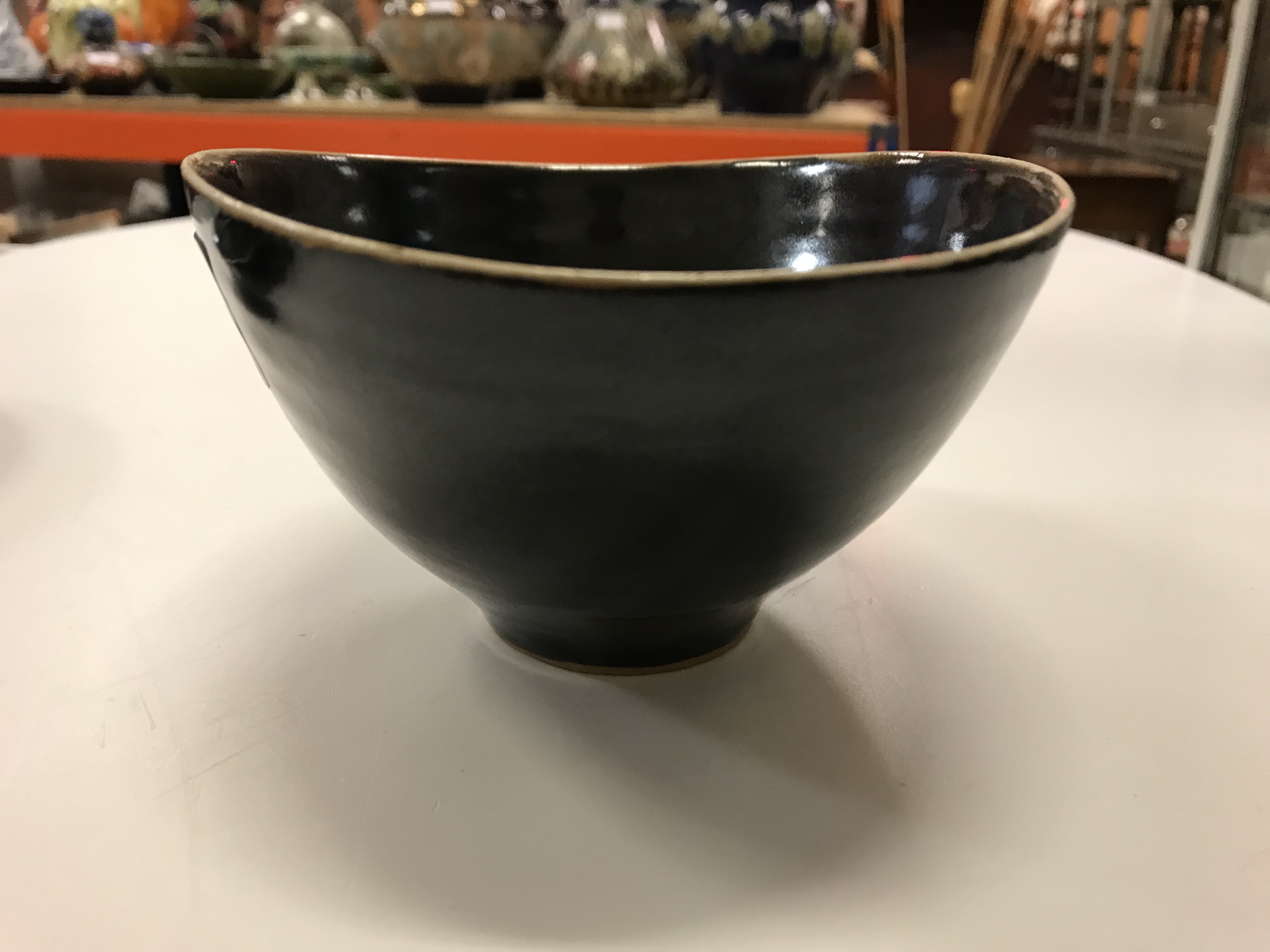 A Lucie Rie black glazed elliptical bowl and saucer, both bearing Lucie Rie marks, - Image 7 of 13