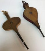 Two pairs of elm mounted leather bellows,