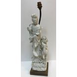 A 18th Century Chinese blanc de chine figure of Guan Yin,