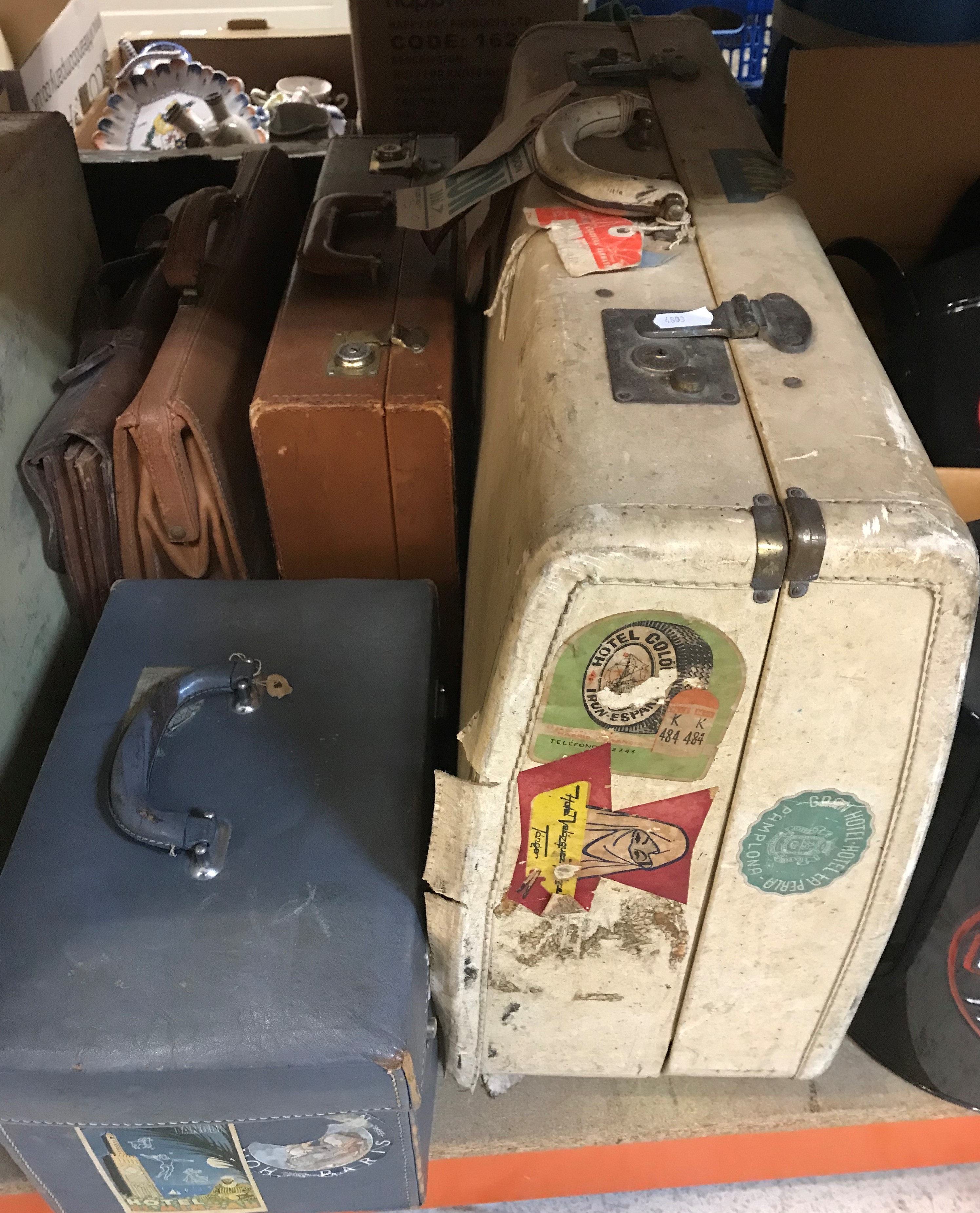 A collection of three various vellum covered suitcases, three briefcases, - Image 5 of 5