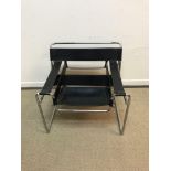 AFTER MARCEL BREUER "Wassily" chair with black leather strapwork on a chrome plated tubular steel