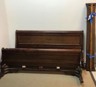 A modern mahogany sleigh bed in the Louis Philippe manner by Willis & Gambier 188 cm wide x 212 cm