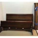 A modern mahogany sleigh bed in the Louis Philippe manner by Willis & Gambier 188 cm wide x 212 cm