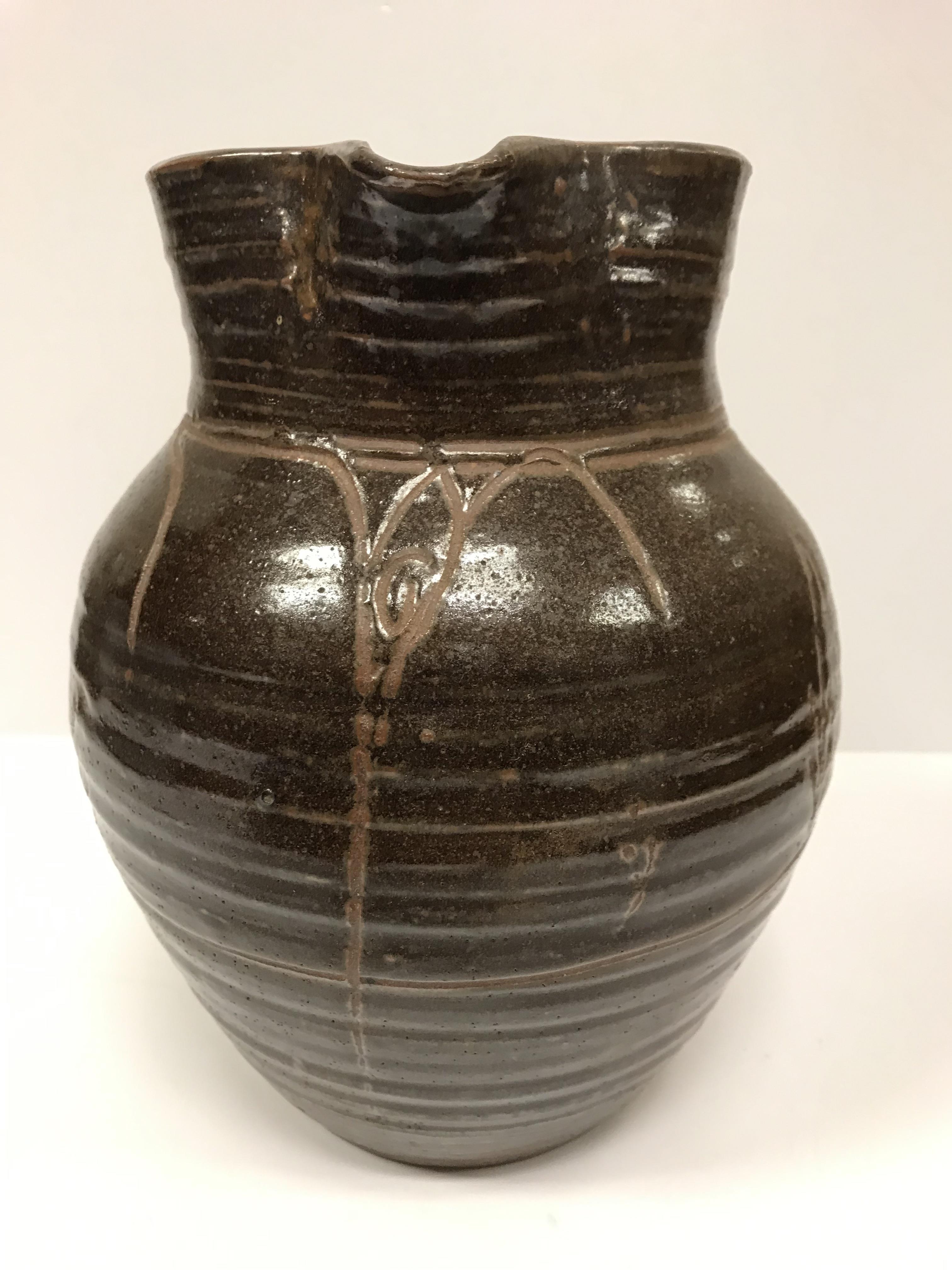 A Michael Cardew Wenfordbridge Pottery brown glazed ribbed jug with stylized floral spray - Image 5 of 22