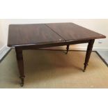 A mahogany extending dining table,