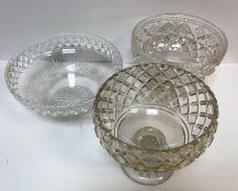 Three early 20th Century cut glass fruit bowls, all with various pineapple cut decoration,