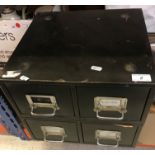 A tin desk top chest of drawers containing a large collection of photographic negatives many