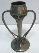 An Archibald Knox for Liberty Tudric pewter two-handled vase with enameled medallion decoration and