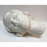 An early to mid 20th Century white pottery head of Liz Clarke in the Art Deco style (American -