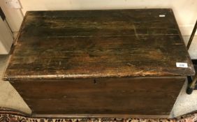 A carpenters wooden tool chest containing various moulding and jack planes,