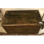 A carpenters wooden tool chest containing various moulding and jack planes,