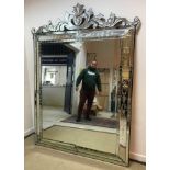 A 20th Century Venetian style mirror of large proportions,