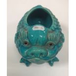 A Burmantofts faience turquoise glazed grotesque vase as a three-legged kylin, No'd.