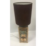 A Troika table lamp of square form with moulded decoration unsigned to base height excluding