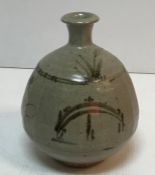 A Toff Milway studio pottery grey glazed vase in the manner of Bernard Leach with Japanese bridge