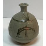 A Toff Milway studio pottery grey glazed vase in the manner of Bernard Leach with Japanese bridge