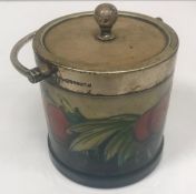 A Moorcroft wisteria plum pattern preserve pot with plated mounts,