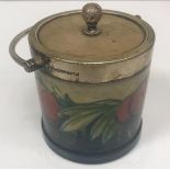 A Moorcroft wisteria plum pattern preserve pot with plated mounts,