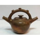 An Elton ware copper lustre twin-spouted teapot 17.