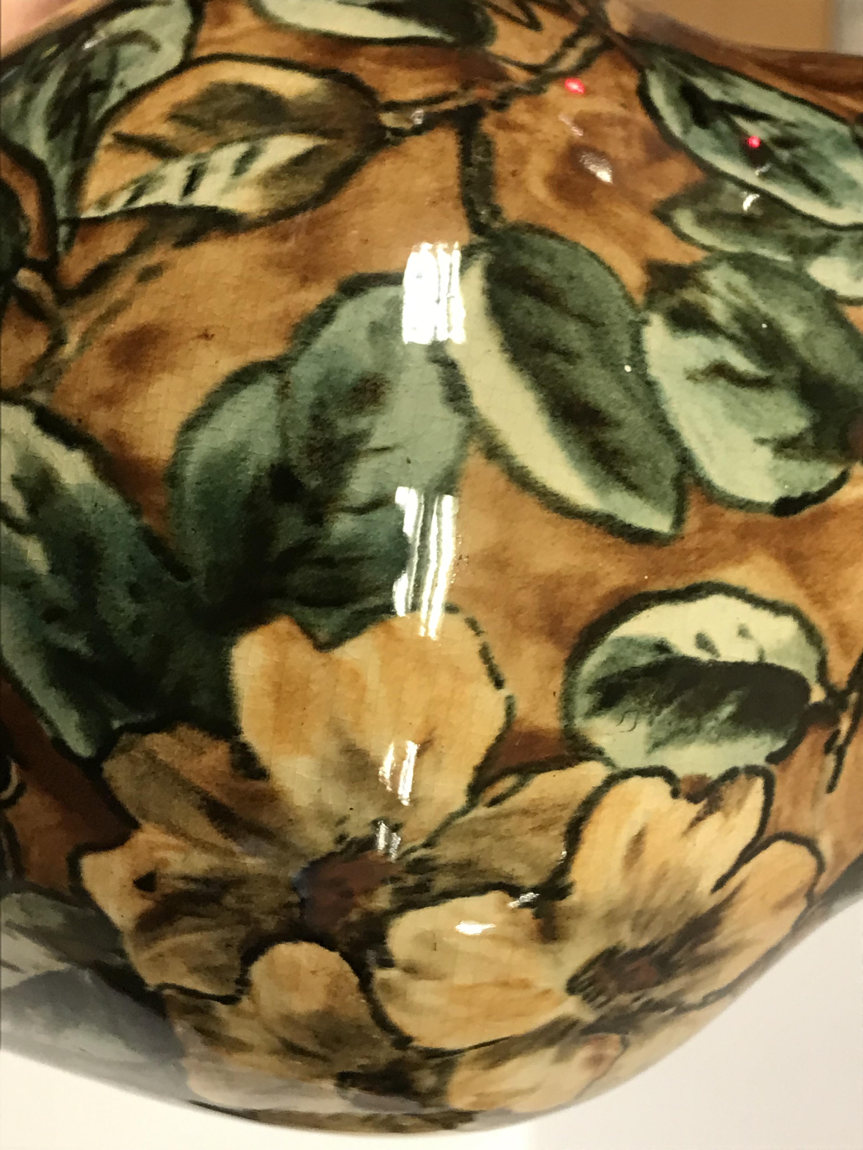 A pair of Doulton Lambeth faience ware vases, the brown ground set with floral decoration, - Image 16 of 22