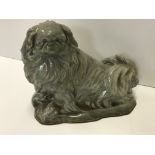 A Charles Vyse Chelsea pottery figure of a Pekingese,