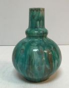 An Arthur E Bells for Della Robbia gourd shaped vase in turquoise inscribed and initialled "ADS