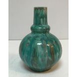 An Arthur E Bells for Della Robbia gourd shaped vase in turquoise inscribed and initialled "ADS