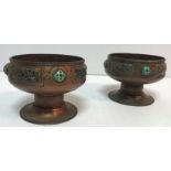 A pair of Arts & Crafts enamelled and beaten copper pedestal bowls by Harry C Hall,