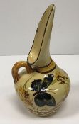 A William Ault Pottery ewer designed by Christopher Dresser with butterfly and floral decoration