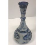 A Moorcroft MacIntyre florian ware vase with piped decoration with incised signature and inscribed